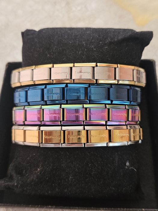 Гривна Nomination.