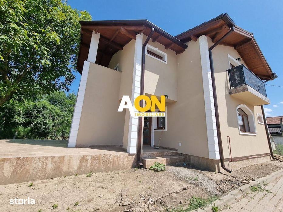 Casă modernă cu 3 dormitoare, terasă și teren generos