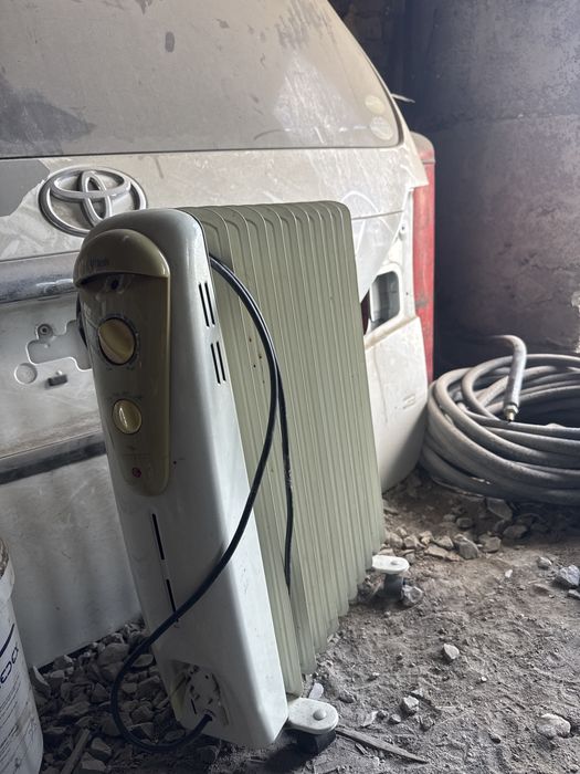 Маслянный обогреватель