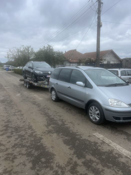 Transport auto pe platforma