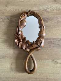 Oglinda foarte veche, scupltata manual dintr-o sigura bucata de lemn