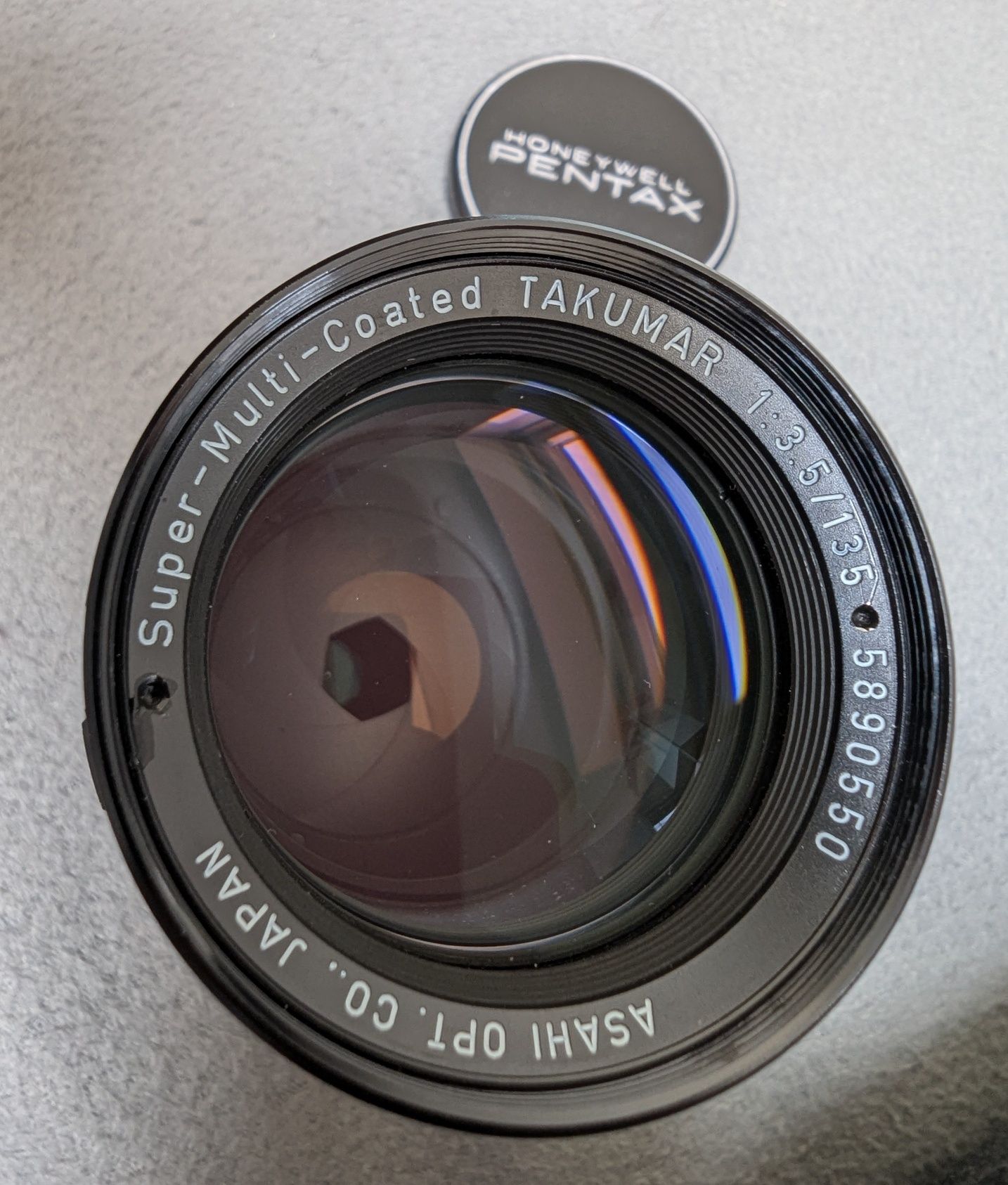 ръчен фотообектив Takumar 3.5/135 Super MC на Canon EF с адаптер
