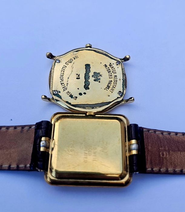 Raymond Weil placate cu aur