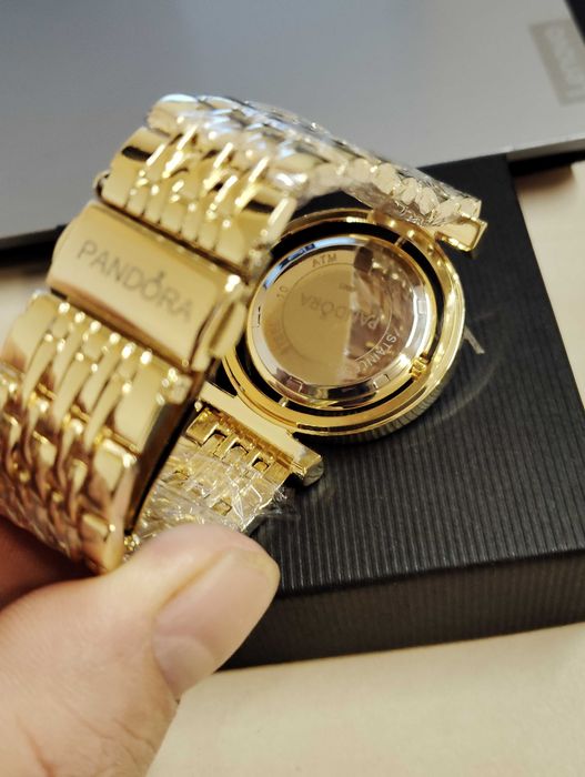 Ceas PandorA cu cadran rotativ auriu