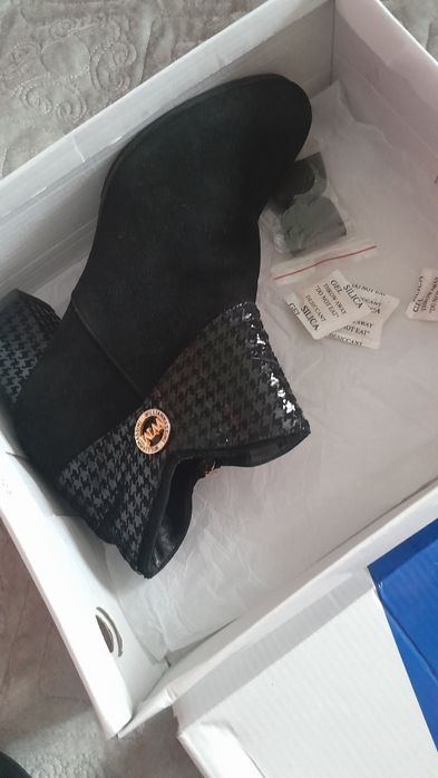 Продам новые сапоги