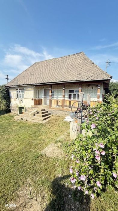 OCOLIS casa batraneasca  cu sura si 14 ari teren!