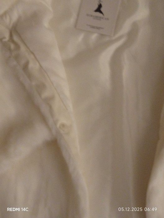 Чисто ново палто