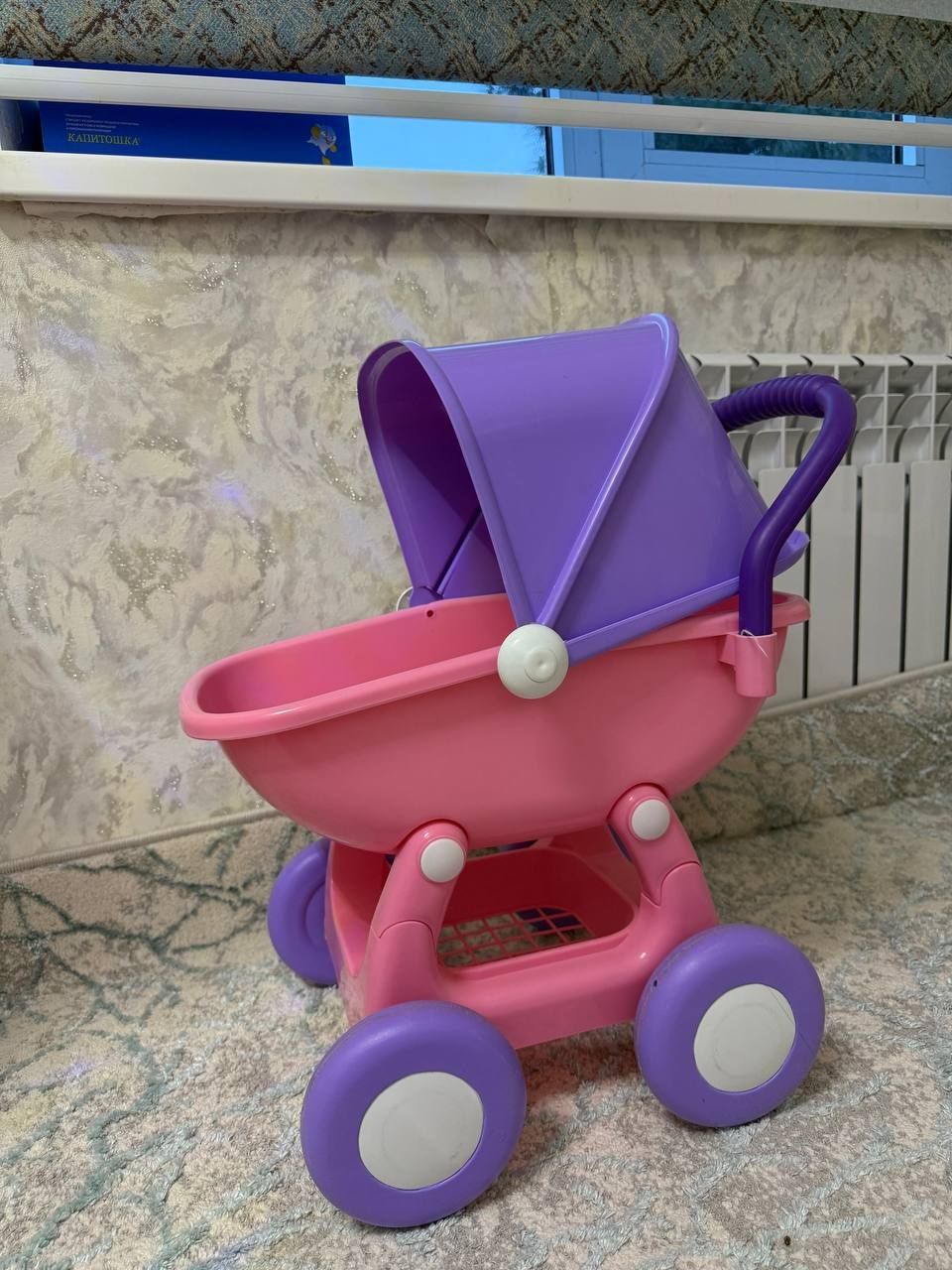 Игрушечная коляска
