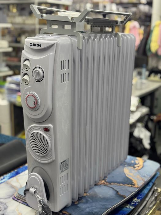 Maslinniy pechka , масляный обогреватель , abogrevatel maslenniy .