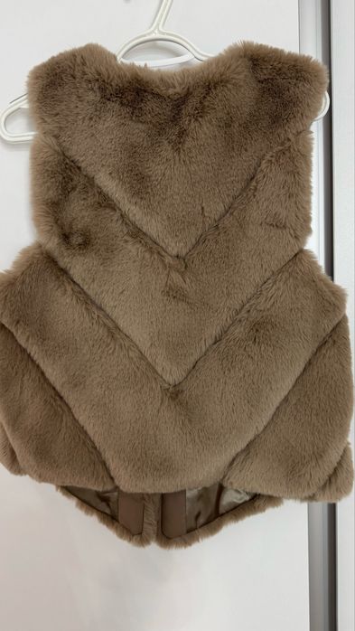 Vesta din blanita artificiala