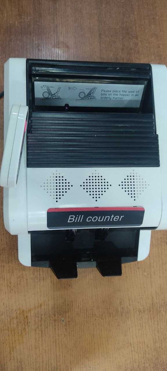 Счётная машинка!
Bill counter!