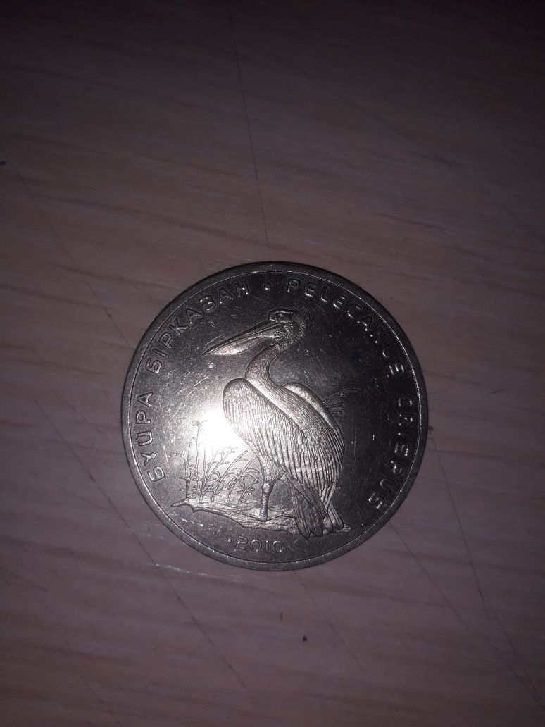 Колекционная монета "Пеликан"