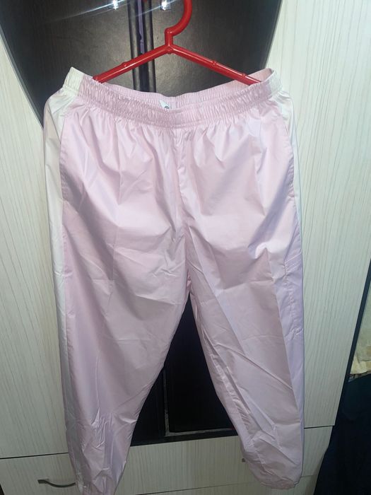 Pantaloni Nike și Ellesse