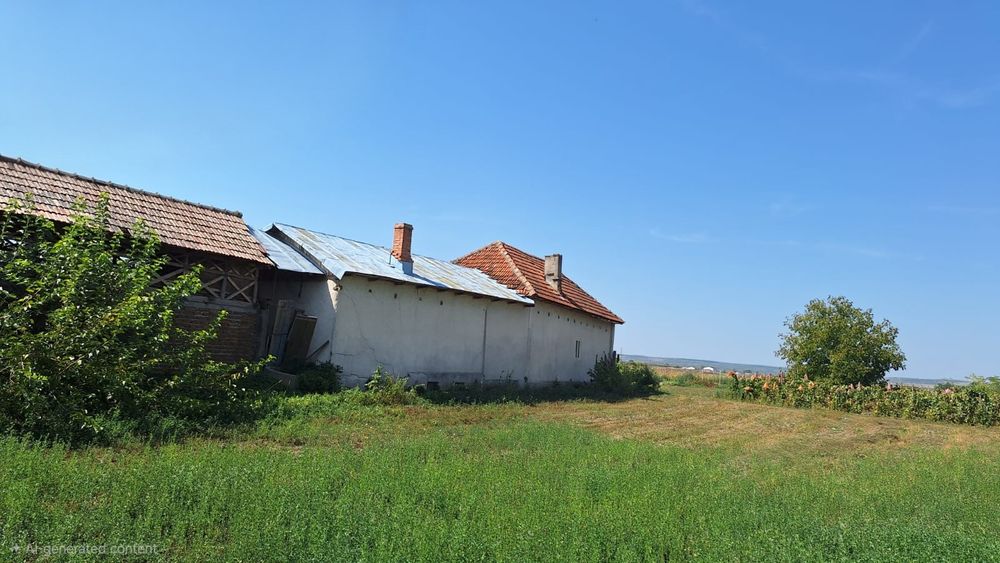 Teren cu casă bătrânească, com. Voicești, jud. Vâlcea 35000 €