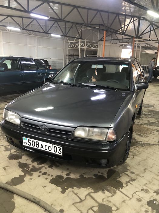 Машина нисан примера р10