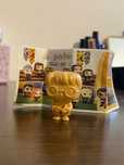 Figurina Harry Potter gold.