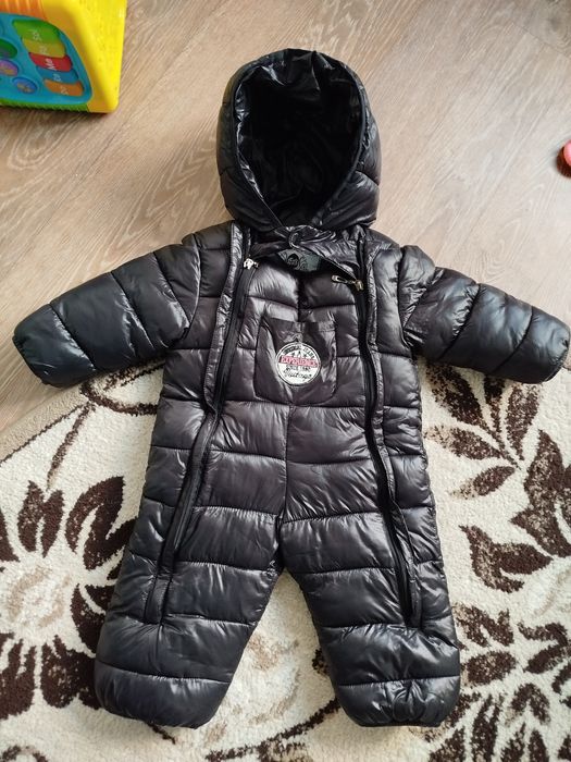 Продам зимний комбинезон  74-90