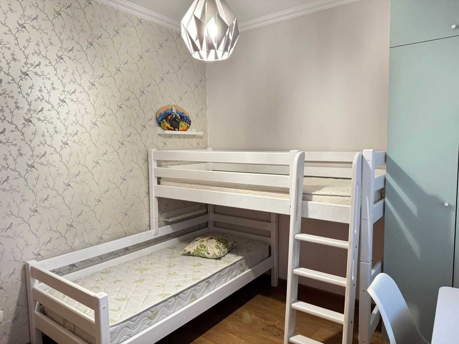 Двухярусная детская кровать