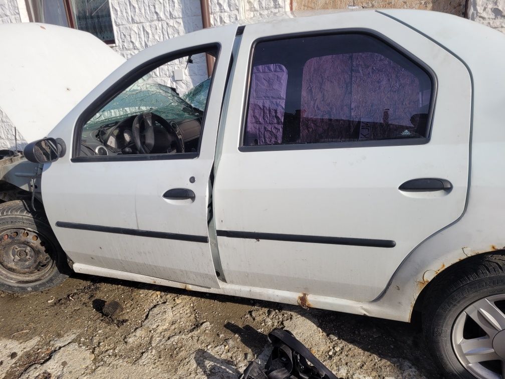 Usa capota  bara janta aer condiționat Dacia Logan