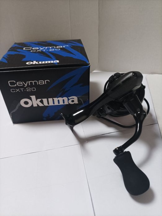 Delphine Black Code & Okuma Ceymar cxt20