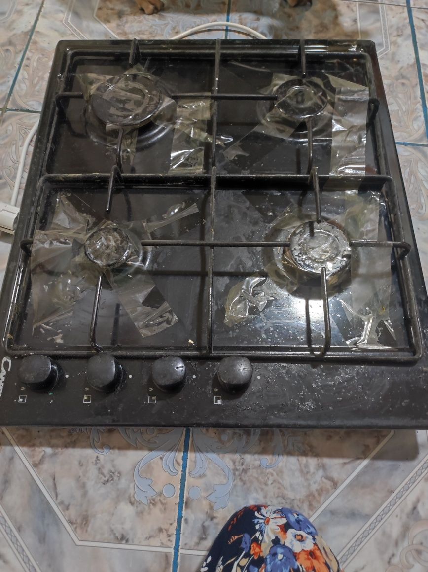 Plită pe gaz Candy.Are și aprinzător electric