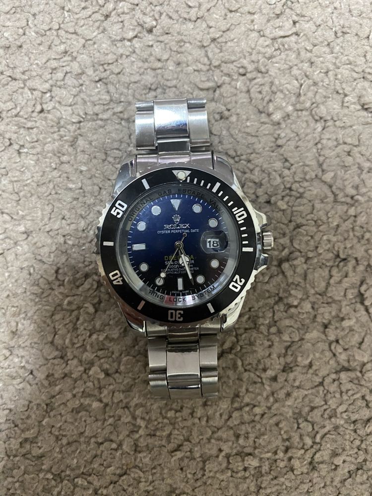 Часовник Rolex.