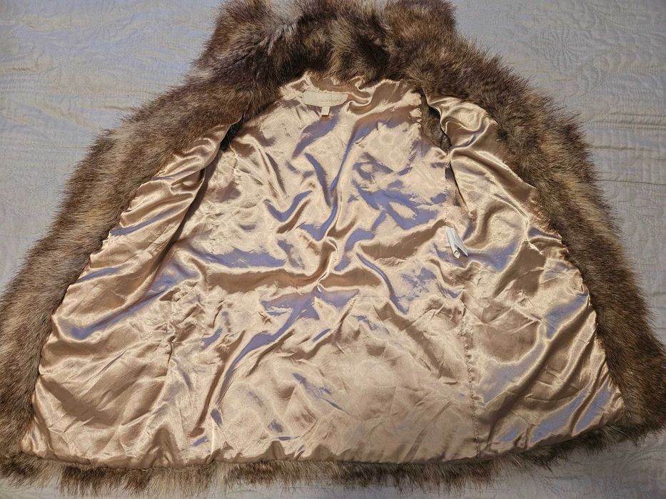 Комплект от пухкав елек и гети