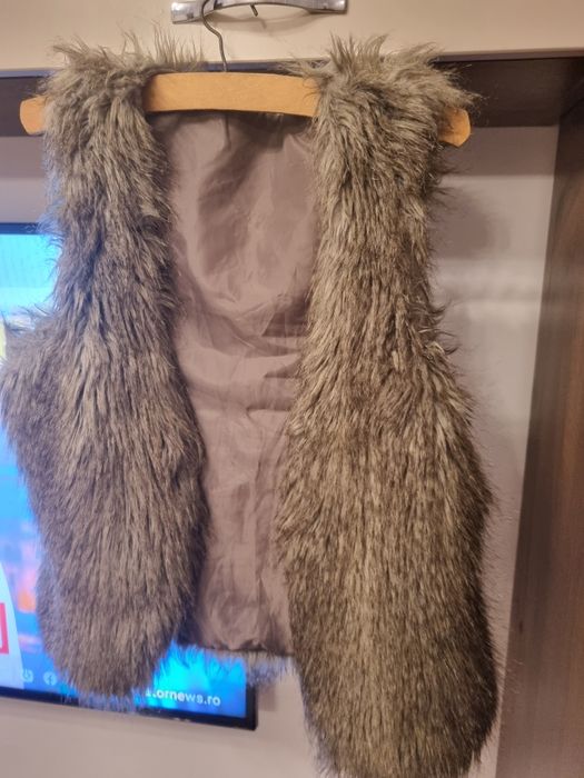 Vesta de blana C&A