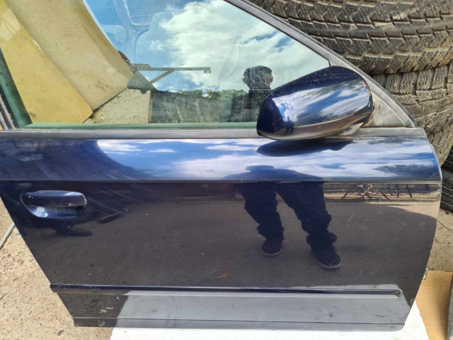 Usa/ Portiera audi a4 b7 berlina dreapta fata culoare albastru