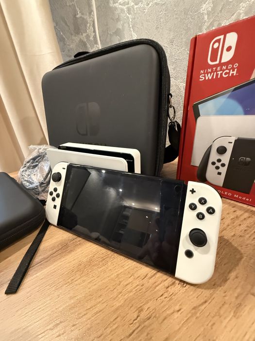 Nintendo Switch OLED + игры Zelda и It Takes Two