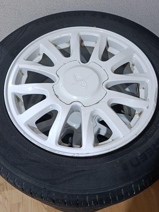 Комплект шины с титанками на 185/65/15 летние. Продается в комплекте 4