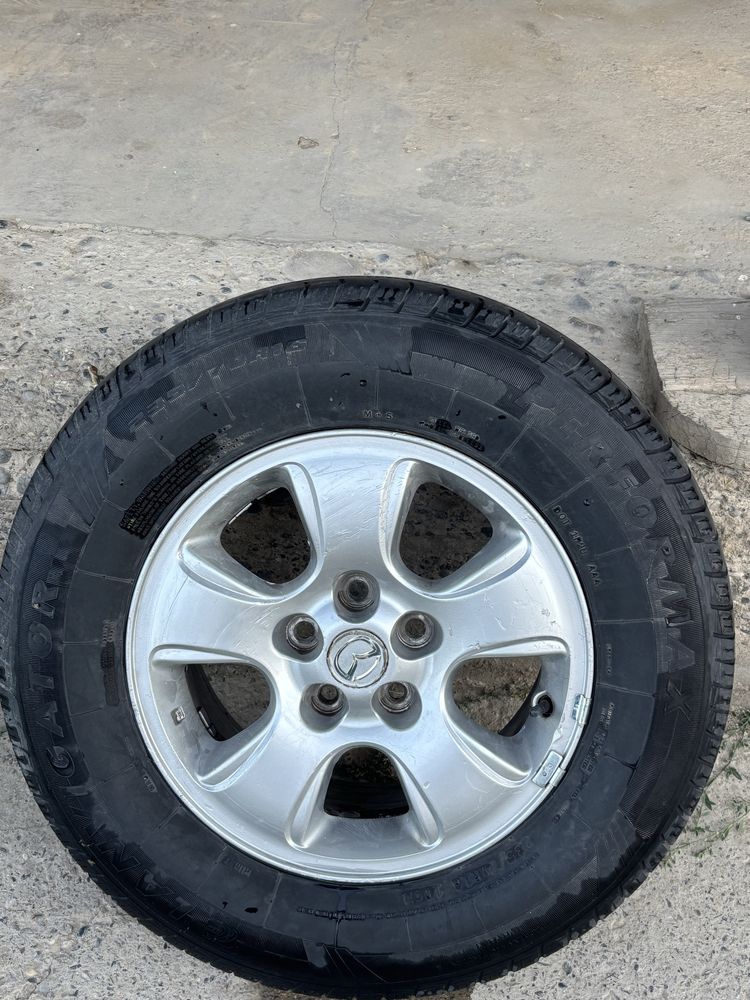 Шины и диски Mazda Tribute. R16