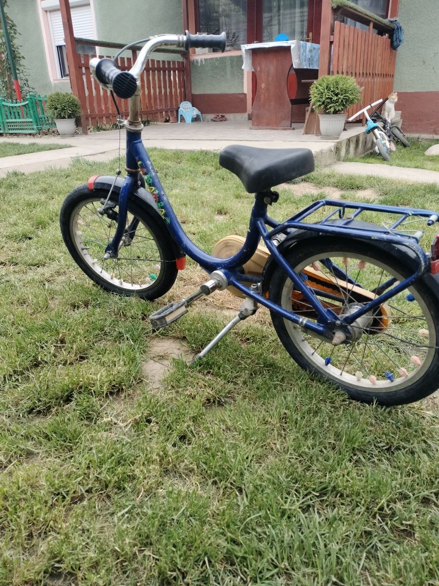 Vând bicicleta copii 16