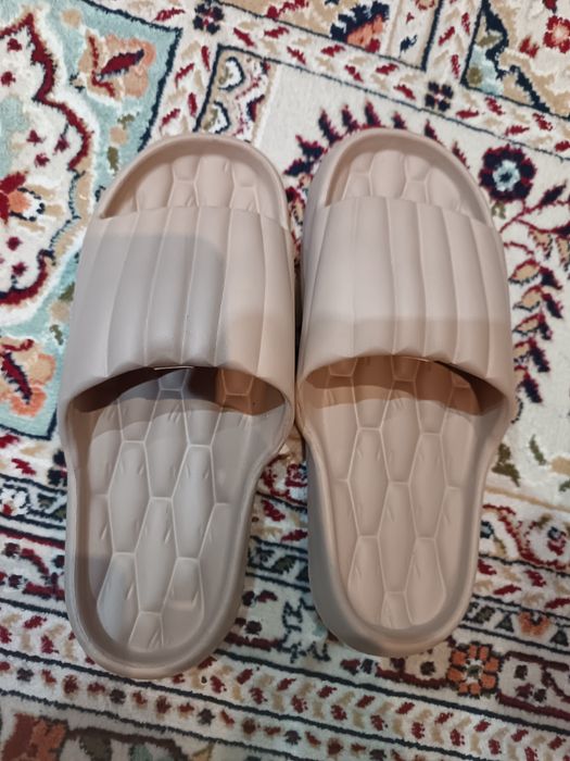 Продам новые тапочки