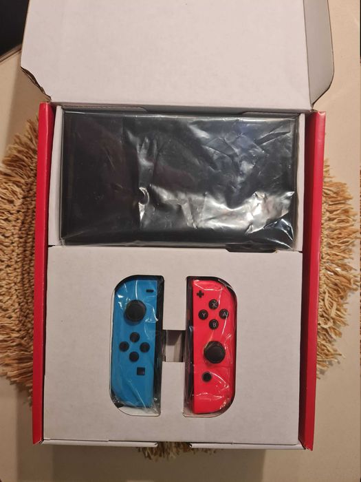 NINTENDO SWITCH OLED 64GB- с гаранция до 27.7.26г.