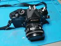 Nikon FM3a + Nikon 50mm f1.4 Af-s , slr 35mm film camera.