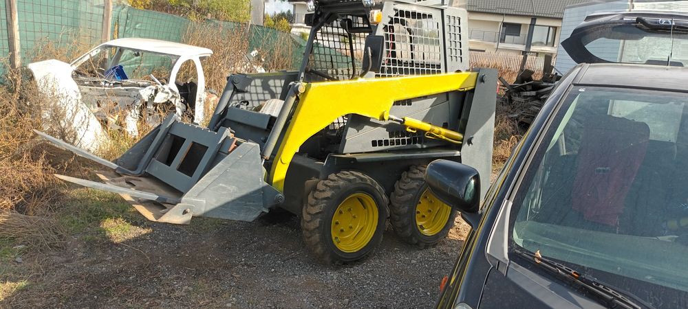 Miniincarcator bobcat fai komatsu 2100 ore cu Furci