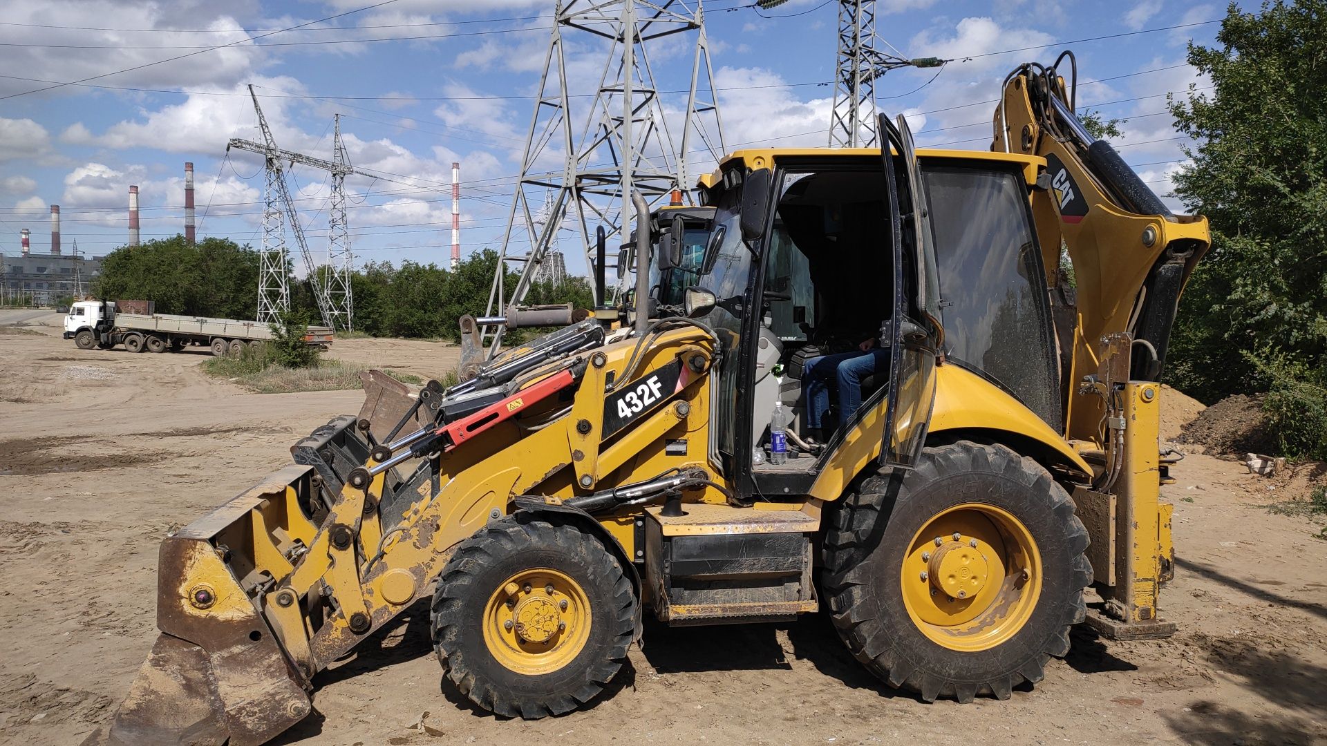 Услуги экскаватора погрузчика cat 432f