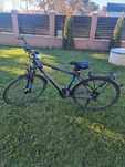 Bicicleta aproape noua
