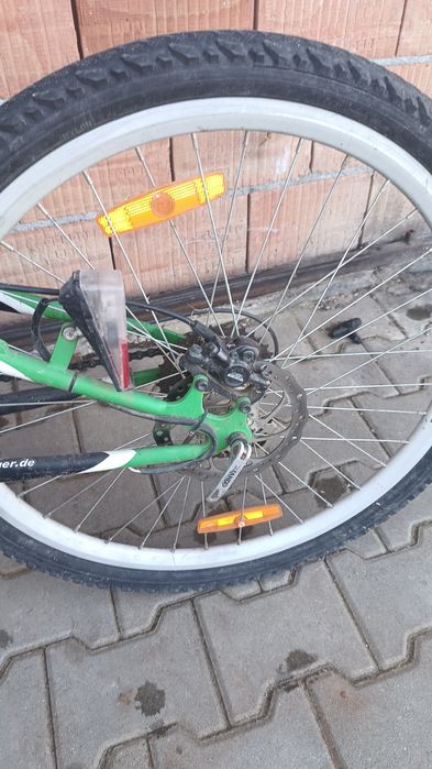 Bicicleta cu frânele pe lichid