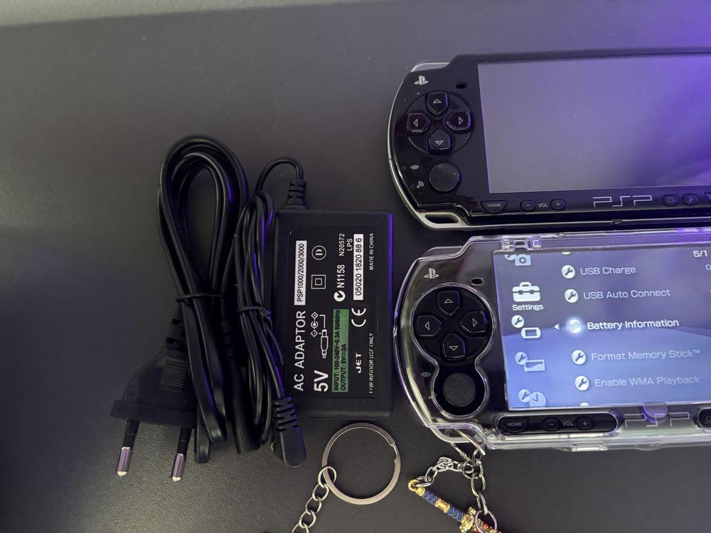 PSP MODAT + ACCESORII + peste 30 de jocuri + 5 UMD de colectie
