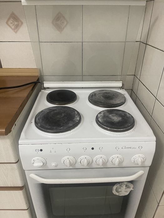 Электроплита с духовкой