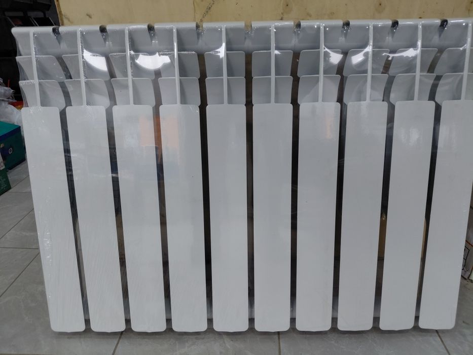 Биметалический  радиотор