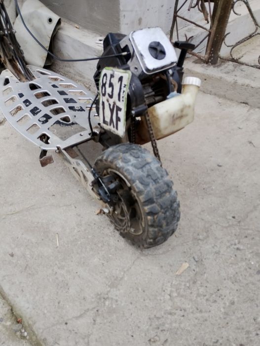 Vând trotineta Uber Scott 70x 71cc