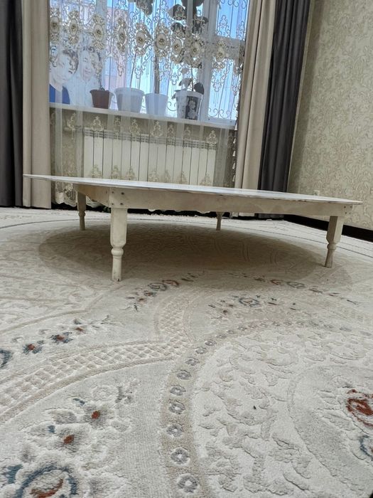 Дөңгелек жер стол.