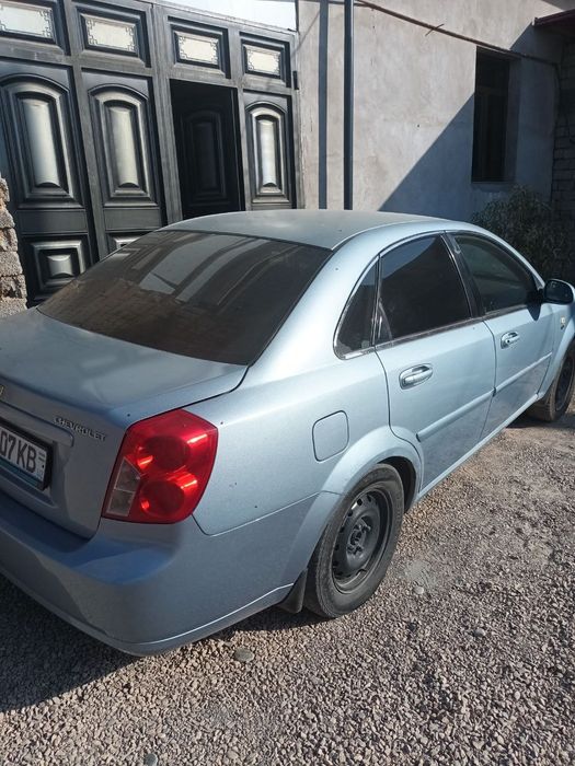 Ласетти сотилади холати яхши баракали машина