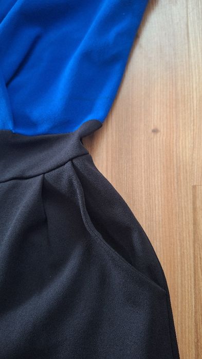 Дамски ефектен гащеризон с ластик на талията и деколте