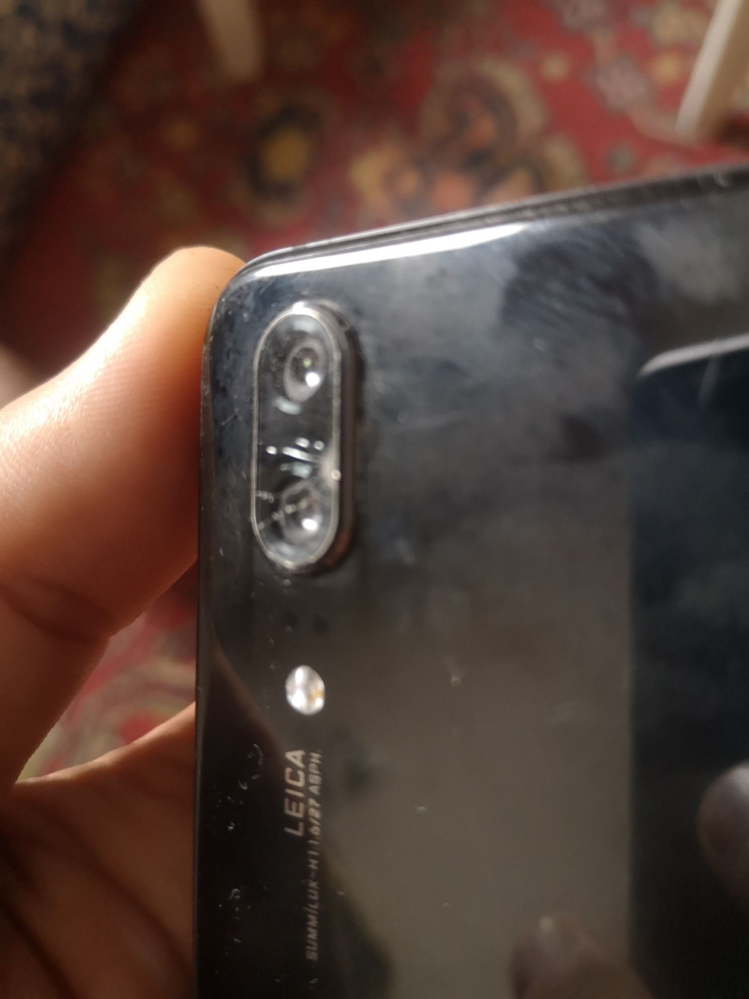 Рабочий телефон  Huawei P20 состояние на фото