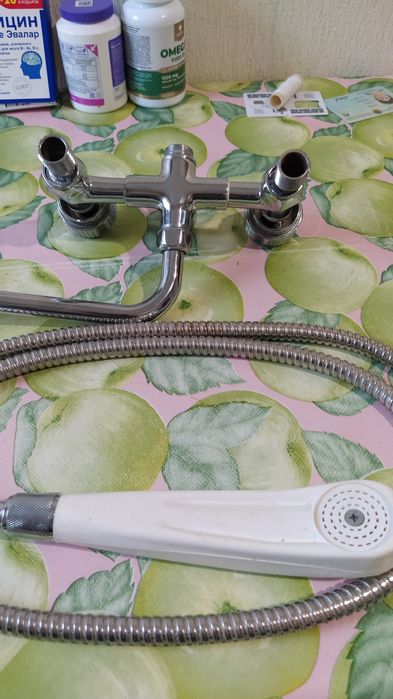 Смеситель в ванну