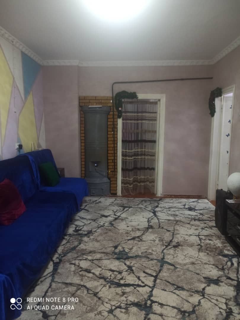 Продается квартира на втором этаже двух этажного дома в городе Каган